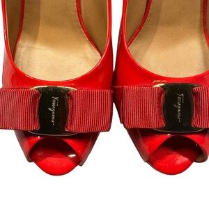 Salvatore Ferragamo Peep-toe Pumps
7 1/2 B
Red